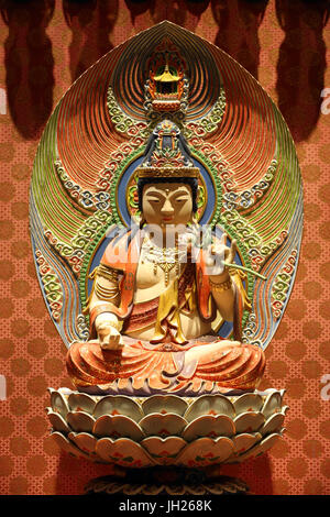 Buddha Tooth Relic Temple in Chinatown. Mahasthamaprapta Bodhisattva. Guardian deity for persons born in the year of the horse. Singapore. Stock Photo