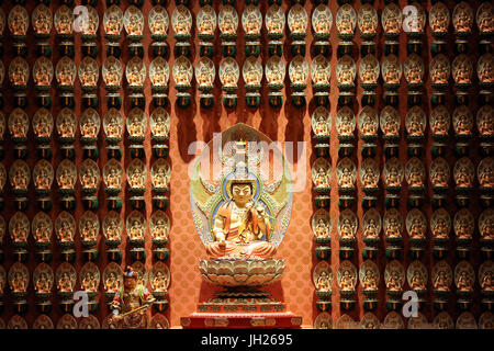 Buddha Tooth Relic Temple in Chinatown. Mahasthamaprapta Bodhisattva. Guardian deity for persons born in the year of the horse. Singapore. Stock Photo