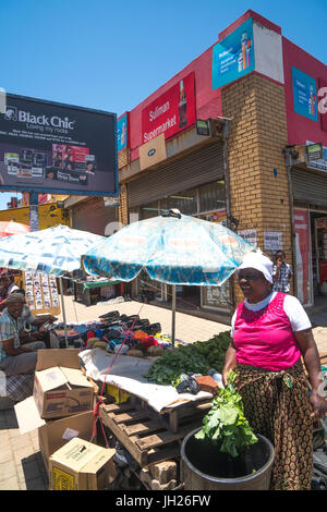 Street scene with vegetable seller in the heart of Soweto (South Western Township), Johannesburg, South Africa, Africa Stock Photo