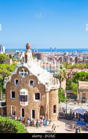 Casa del Guarda lodge by Antoni Gaudi at Parc Guell, UNESCO, with a skyline view of the city of Barcelona, Catalonia, Spain Stock Photo