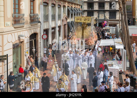 Locals taking part in the Resurrection Parade on Easter Sunday, Malaga, Costa del Sol, Andalusia, Spain, Europe Stock Photo