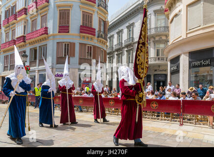 Locals taking part in the Resurrection Parade on Easter Sunday, Malaga, Costa del Sol, Andalusia, Spain, Europe Stock Photo