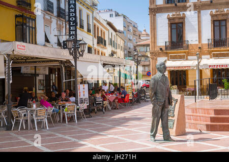 View of statue and restaurants, Plaza del Socorro, Ronda, Andalusia, Spain, Europe Stock Photo