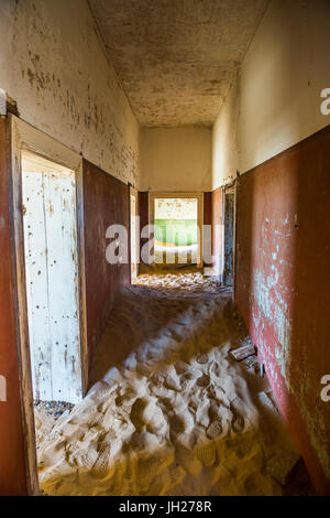 Sand in an old colonial house, old diamond ghost town, Kolmanskop (Coleman's Hill), near Luderitz, Namibia, Africa Stock Photo