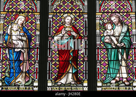 St Joseph's church.  Stained glass window. Jesus and Holy Virgin.  Singapore. Stock Photo