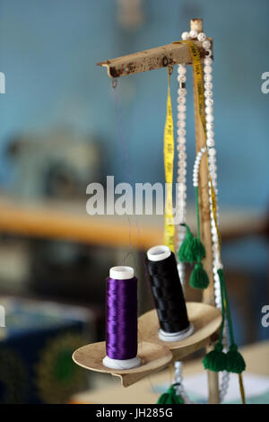 Tayloring workshop in Africa.  Close-up of sewing box.  Lome. Togo. Stock Photo