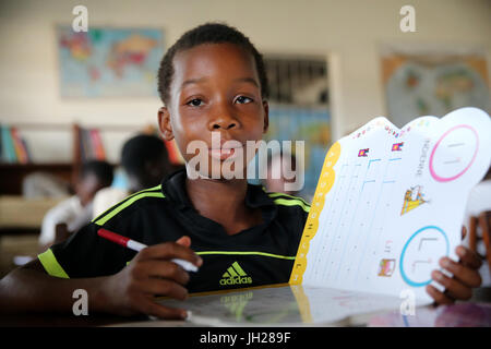 African  primary school. Child sponsored by french NGO : la Chaine de l'Espoir. The library.  Lome. Togo. Stock Photo