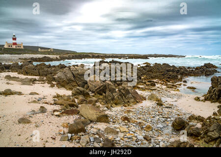 Lighthouse and bay at the southernmost tip of Africa, Cape Agulhas, Western Cape, South Africa, Africa Stock Photo