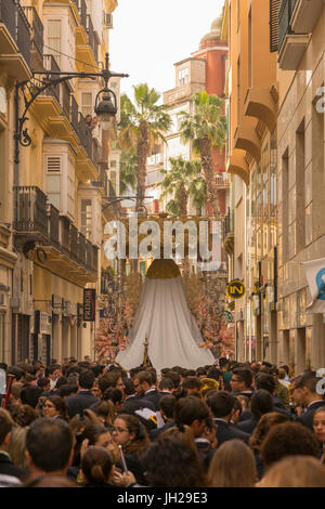 Locals taking part in the Resurrection Parade on Easter Sunday, Malaga, Costa del Sol, Andalusia, Spain, Europe Stock Photo