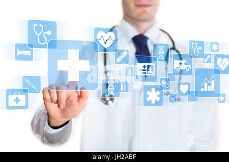 Medical doctor showing icons of health care services on a digital screen, isolated on white background Stock Photo