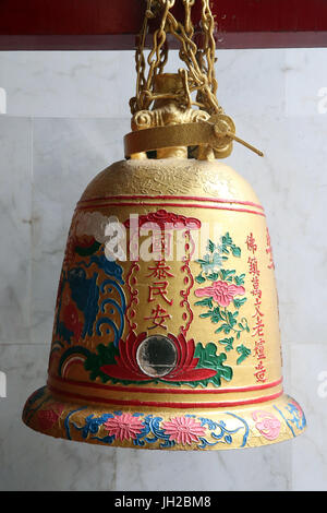 Taoist temple. Nghia An Hoi Quan pagoda. Buddhist bell. Ho Chi Minh City. Vietnam. Stock Photo
