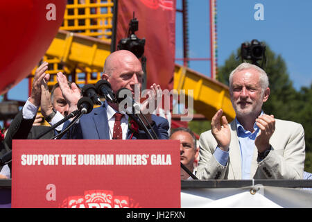 Matt Wrack, General Secretary of the Fire Brigades Union, is applauded by jeremy Corbyn, at the Durham Miners' Gala at Durham City, England. Stock Photo