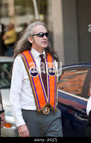 Belfast, UK. 12th Jul, 2017. Orangemen and women celebrate 12th July Battle of the Boyne in Belfast, Northern Ireland on the 12th July 2017.   Over Seventy (70) bands and hundreds of people took to the streets of Belfast as part of the Annual 12th July Battle of the Boyne Celebration. This is where Protestant King William of Orange defeated Catholic King James II      Credit: Bonzo/Alamy Live News Stock Photo