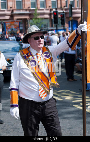 Belfast, UK. 12th Jul, 2017. Orangemen and women celebrate 12th July Battle of the Boyne in Belfast, Northern Ireland on the 12th July 2017.   Over Seventy (70) bands and hundreds of people took to the streets of Belfast as part of the Annual 12th July Battle of the Boyne Celebration. This is where Protestant King William of Orange defeated Catholic King James II      Credit: Bonzo/Alamy Live News Stock Photo