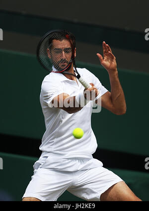 London, UK. 12th July, 2017. Marin Cilic of Croatia competes during the men's singles quarter-finals match with Gilles Muller of Luxembourg at the Wimbledon Championships 2017 at Wimbledon, London, Britain on July 12, 2017 Credit: Jin Yu/Xinhua/Alamy Live News Stock Photo