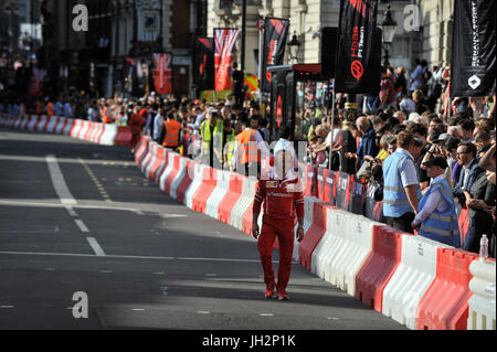 London, UK.  12 July 2017.  Crowds watch the parade of Formula One cars taking place around a circuit passing Trafalgar Square and Whitehall during a promotional event called F1LiveLondon ahead of the British Grand Prix at Silverstone.   Credit: Stephen Chung / Alamy Live News Stock Photo