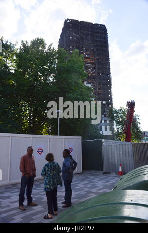 London, UK. 12th Jul, 2017. Grenfell tower. 7pm Local community prepares for a vigil. Credit: Philip Robins/Alamy Live News Stock Photo