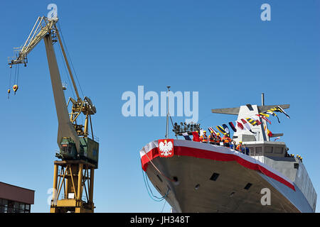 Launching of ORP Slazak in Naval Shipyard Gdynia. New patrol boat of Polish Navy has 95 meters long, 13 meters wide, and ultimately 97 crew members. C Stock Photo