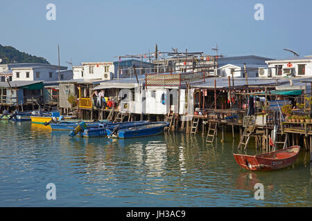 Fishing village of Tai O, Hong Kong, China. Most of the houses are built on stilts over the water and boats are used as the main means of transport. Stock Photo