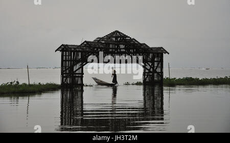 Wooden gate on Inle lake in Shan state, Myanmar. The Inle Lake is famous for its floating villages and the unique way of life of Intha people. Stock Photo