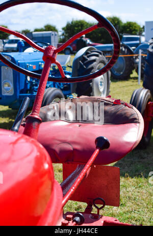 Vintage tractor steering wheel and seat at southern agricultural show Stock Photo