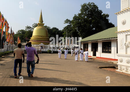 Dambulla Sri Lanka Golden Temple People Walking Near Gold Stupa By Entrance Stock Photo