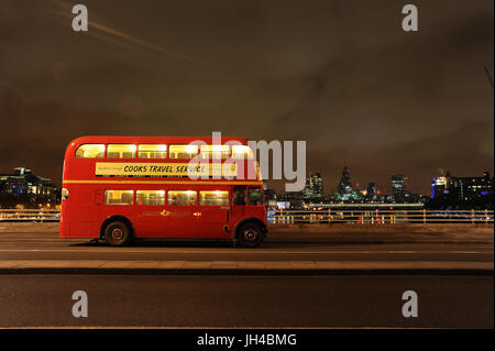 London Bus on Waterloo Bridge at night. Stock Photo