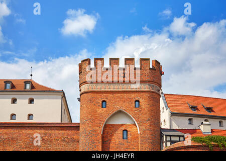 Bridge Gate to the Old Town in Torun, medieval city wall fortification, Poland. Stock Photo