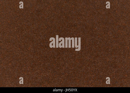 Dark brown paper texture cardboard background. Stock Photo