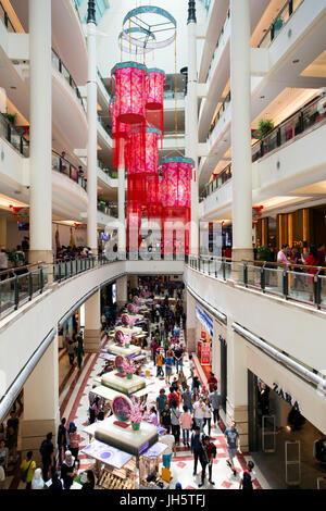 Interior of Suria KLCC a shopping mall located in the world famous Petronas Twin Towers in central Kuala Lumpur, Malaysia. Stock Photo