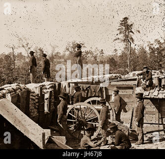 TITLE:  Atlanta, Georgia. Sherman's men in Confederate fort east of Atlanta  CALL NUMBER:  LC-B811- 3634[P&P]  REPRODUCTION NUMBER:  LC-DIG-cwpb-03400 (digital file from original neg.)  RIGHTS INFORMATION:  No known restrictions on publication.  MEDIUM:  1 negative : glass, wet collodion.  CREATED/PUBLISHED:  1864.  CREATOR:  Barnard, George N., 1819-1902, photographer.  NOTES:  Caption from negative sleeve: Interior view of confederate Fort East of Atlanta, GA. Stock Photo