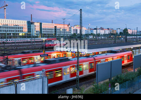 Railway with trains on Hackerbrucke train and S-bahn station in Munich, Germany Stock Photo