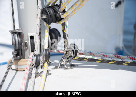 Several colorful ropes on a sailboat or sailing boat Stock Photo