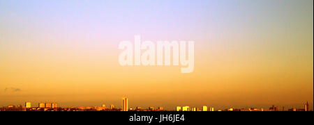 Glasgow city panoramic wide view looking east colorful yellow sunset sky over the west  end cityscape skyline Stock Photo