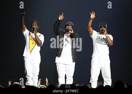 NEW YORK-JUL 7: (L-R) Shawn Stockman, Wanya Morris and Nathan Morris of Boyz II Men perform during The Total Package Tour at NYCB Live at the Nassau V Stock Photo
