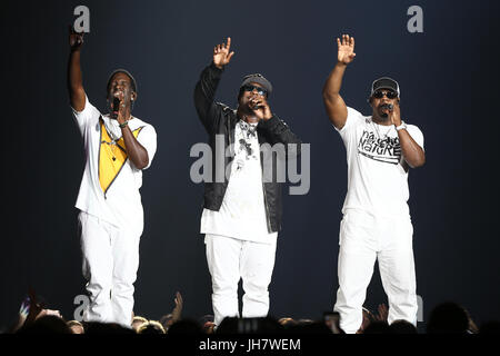 NEW YORK-JUL 7: (L-R) Shawn Stockman, Wanya Morris and Nathan Morris of Boyz II Men perform during The Total Package Tour at NYCB Live at the Nassau V Stock Photo