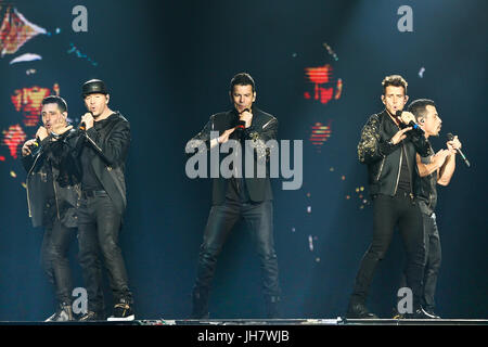 NEW YORK-JUL 7: (L-R) Jonathan Knight, Donnie Wahlberg, Jordan Knight, Joey McIntyre and Danny Wood of New Kids on the Block perform during The Total  Stock Photo