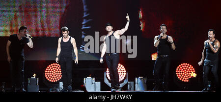 NEW YORK-JUL 7: (L-R) Jonathan Knight, Joey McIntyre, Donnie Wahlberg, Jordan Knight and Danny Wood of New Kids on the Block perform during The Total  Stock Photo