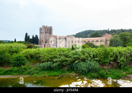 View of St. Mary Abbey  in Lagrasse. Romanesque Benedictine abbey, was founded in the 7th -century. France. Stock Photo