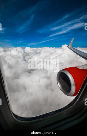 Classic image through aircraft window onto jet engine Stock Photo