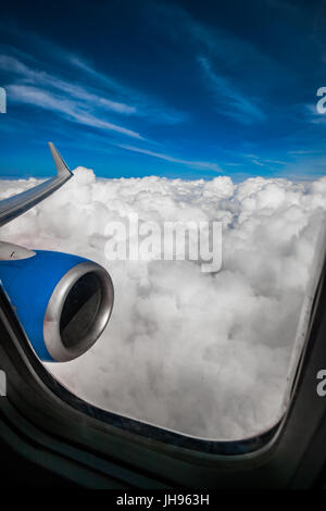 Classic image through aircraft window onto jet engine Stock Photo