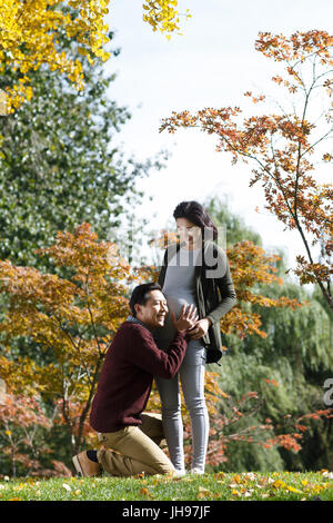 Young couple taking a walk outside Stock Photo