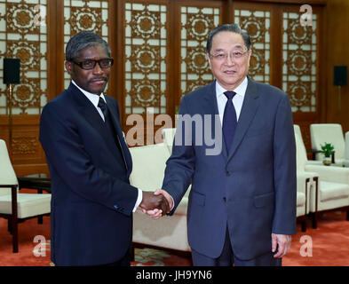 Beijing, China. 13th July, 2017. Yu Zhengsheng, chairman of the National Committee of the Chinese People's Political Consultative Conference, meets with Teodoro Nguema Obiang Mangue, vice president of Equatorial Guinea, in Beijing, capital of China, July 13, 2017. Credit: Xie Huanchi/Xinhua/Alamy Live News Stock Photo