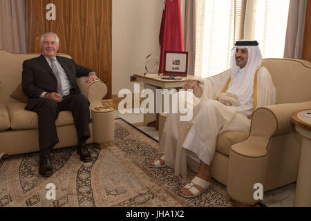 U.S. Secretary of State Rex Tillerson during a meeting with the Emir of Qatar, Sheikh Tamim Bin Hamad Al Thani at the Sea Palace July 11, 2017 in Doha, Qatar. Tillerson is meeting leaders of the Gulf Cooperation Council in an attempt to end the isolation of fellow member Qatar by a Saudi led coalition. Stock Photo