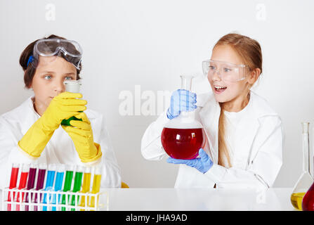 Happy kids making a experiment Stock Photo