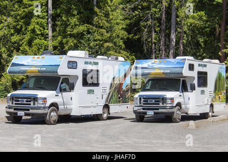 Rental RV's from Cruise America and Cruise Canada parked next to each other in Wells Gray Provincial Park, British Columbia, Canada Stock Photo