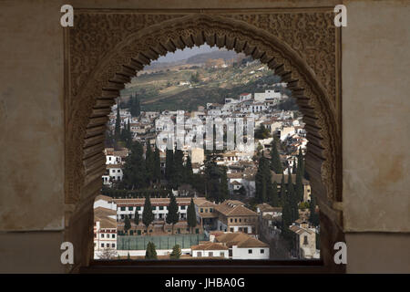 El Albayzin district pictured from the Ladies Tower (Torre de las Damas) in the Garden of the Partal (Jardines del Partal) in the palace complex of the Alhambra in Granada, Andalusia, Spain. Stock Photo