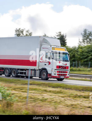 Side view of truck or lorry on motorway freeway highway  Model Release: No.  Property Release: No. Stock Photo