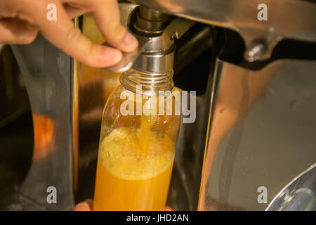 Orange Juice Dispenser Stock Photo