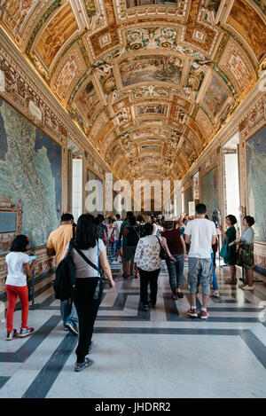 Rome, Italy - August 19, 2016: Interior view of tourists in Vatican Museums.  The Vatican Museums are Christian and art museums located within the cit Stock Photo